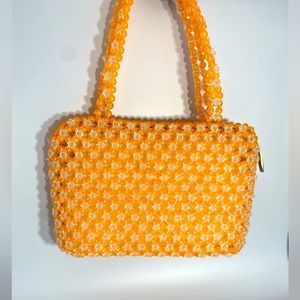 Orange beaded bag